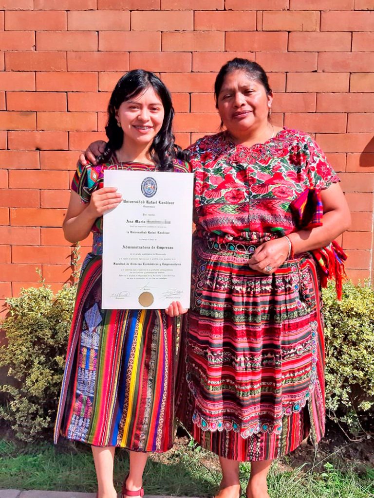 Ana María (shown with her mom) graduated with a Licenciatura in Business Administration. Guatemala, 2021.